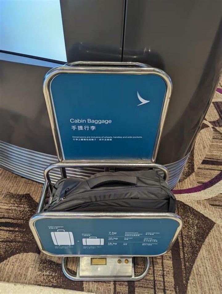 Do cathay pacific weigh hand luggage?