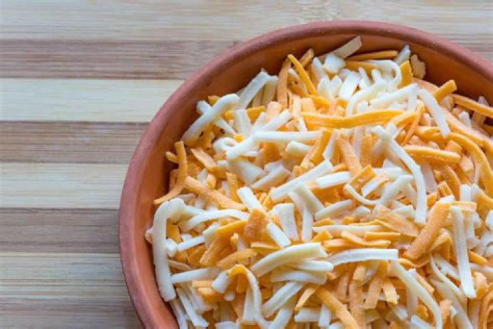 Is sawdust in grated cheese?