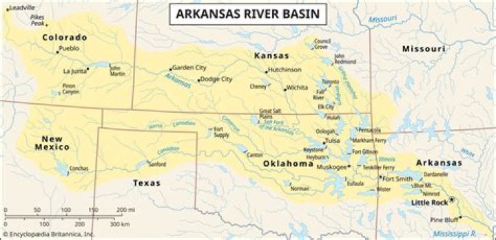 Where a river broadens and enters the sea?